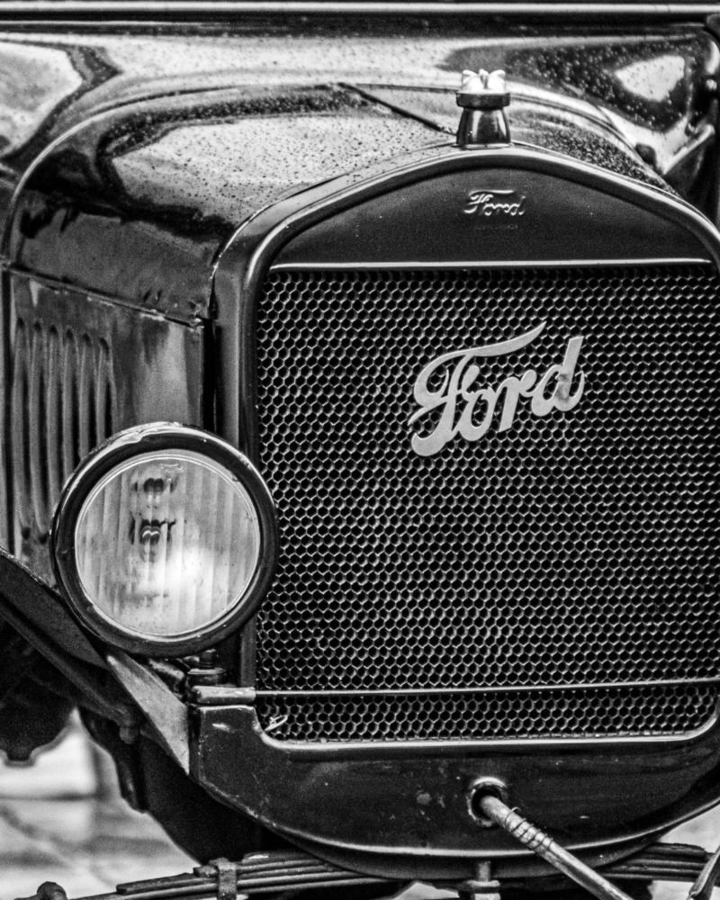 A 1920s vintage car seen from the front