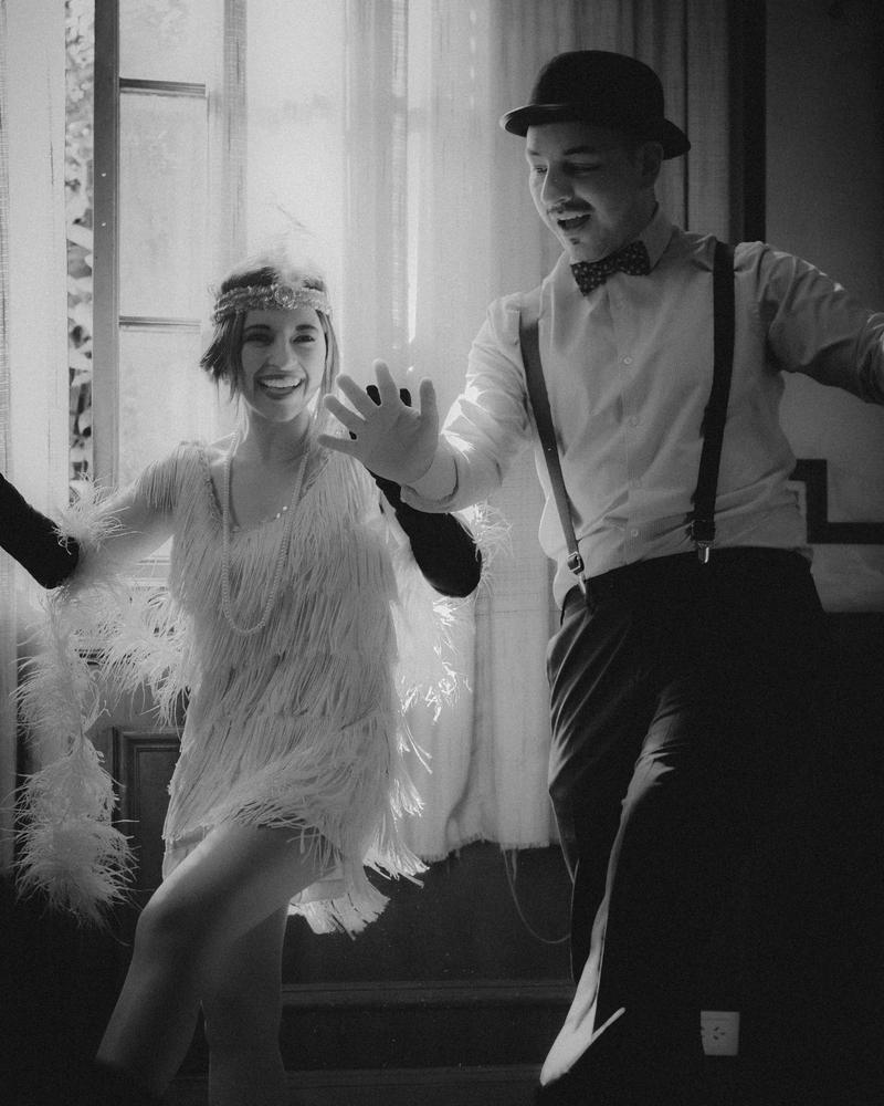 A couple in 1920s clothes, dancing